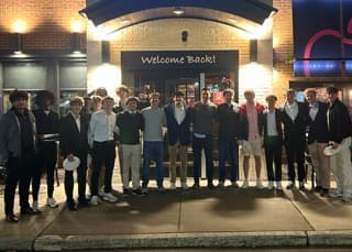 Iconic crew outside Applebee's after year-end dinner